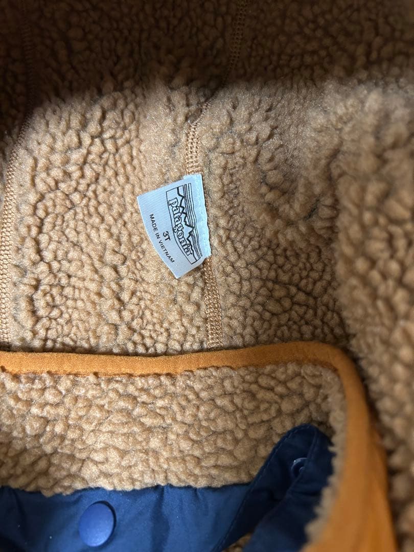 patagonia ベビー・リバーシブル・トリブルズ・フーディ